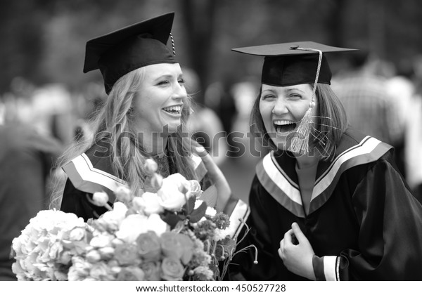 Joy Graduation Ceremonyyoung Female Graduates Laughing Stock Photo