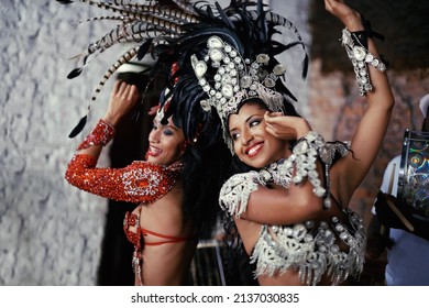 For the joy of samba. Shot of two beautiful samba dancers performing in a carnival. - Powered by Shutterstock