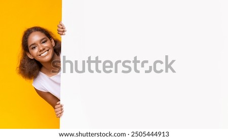 Similar – Brunette surfer woman with top and bikini kissing surfboard