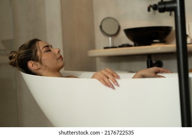 Joyful Blonde Woman Is Spending Good Time While Having Bath During Spa Day At Home. Concept Of Beauty, Self-care, Cosmetics