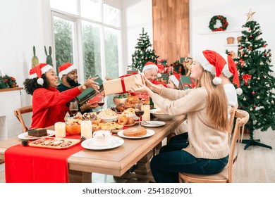 Joyful Christmas Dinner Celebration, Family Friends Gather Around the Table Meal, Enjoying Delicious Food and Drinks in Beautifully Decorated Home, Creating Happy Memories During Holiday Event - Powered by Shutterstock