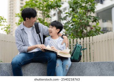 A joyful father and son share a sunny day in the garden, reading a book together. Their bright smiles reflect love and bonding, creating cherished memories in nature. - Powered by Shutterstock