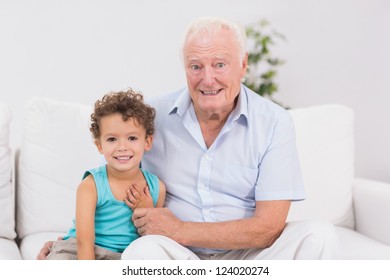 Joyful Grandfather Grandson Sitting On Sofa Stock Photo 124020274 ...