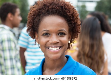 Joyful Laughing African American Woman With Group Of Friends