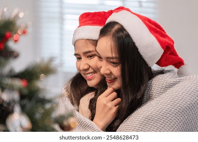 Joyful Lesbian Couple Embracing on Celebration Day with Thoughtful Expressions and Festive Atmosphere - Powered by Shutterstock