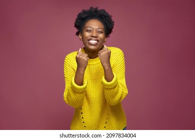 Joyful lucky young african american girl winner feeling triumph, rejoicing goal achievement. Fortune, jackpot, bingo - Shutterstock ID 2097834004