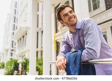 Joyful man enjoying life in city