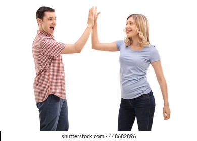 Joyful Man And Woman Greeting Each Other With A High Five Isolated On White Background