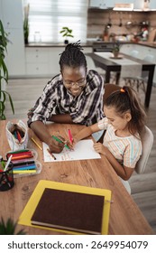 Joyful moments of creativity shared between a child and caregiver