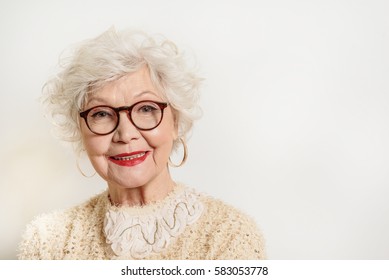 Joyful Senior Lady In Glasses Laughing