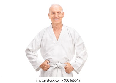 Joyful senior in a white kimono with a white belt looking at the camera and smiling isolated on white background - Powered by Shutterstock