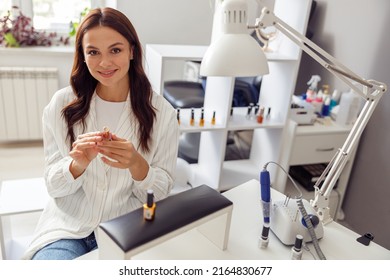 Joyful Woman Enjoying Nail Service In Beauty Studio