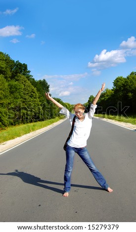 joyful woman on the empty road