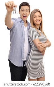 Joyful Young Couple With A Pair Of Keys Isolated On White Background