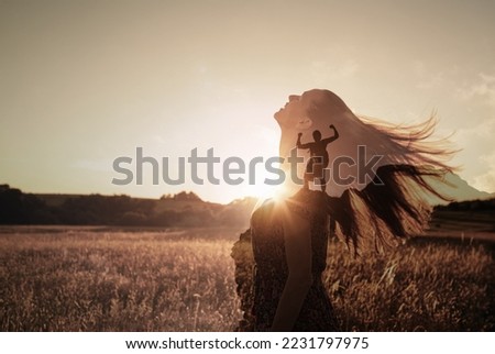 Joyful young woman looking up finding hope strength and mental power.
