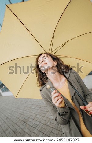 Similar – Image, Stock Photo Content woman under umbrella on beach in summer looking at camera