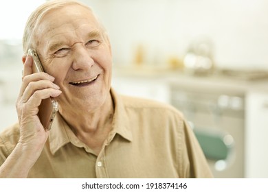 Joyous Aged Gentleman Having A Pleasant Phonecall