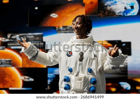 Joyous astronaut analyzing Mars planetary data in spacecraft powered by advanced engineering. Happy starship crew member exploring deep space, doing Martian surface research