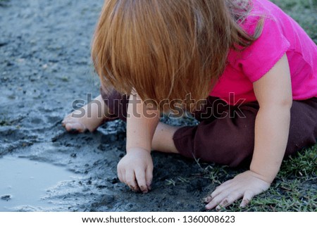 Similar – Foto Bild Baby spielt am Strand.