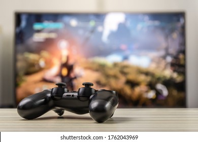 Joystick Or Gamepad On A Table.Video Game Controller.