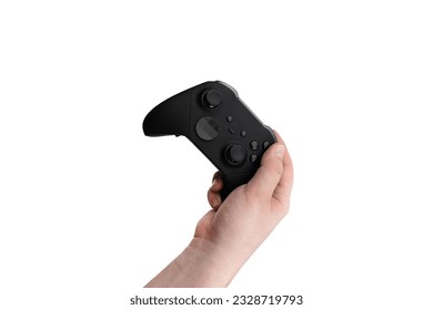 Joystick in hand on a white background. Gamepad in hand closeup isolated on white background.