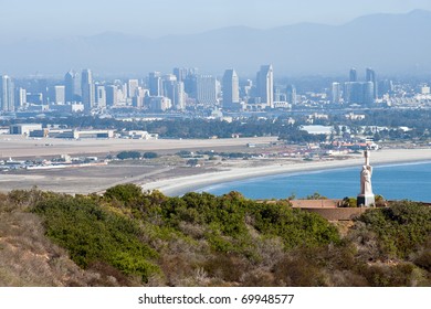 Juan Rodriguez Cabrillo Statue And Panorama Of San Diego, California