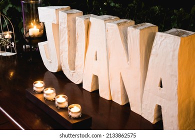 Juana In White Block Letters