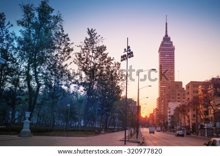 Juarez Avenue near central Alameda park and Torra Latina in morning sunrise, Mexico city
