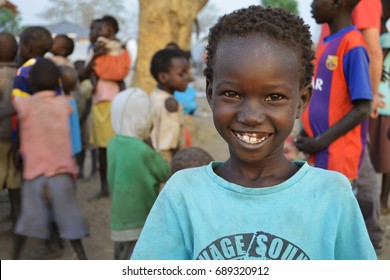 Juba, South Sudan, February 2017. Portrait Of A Little Smiling Girl At A Camp For Internally Displaced Persons (IDPs). Captured During Civil War.