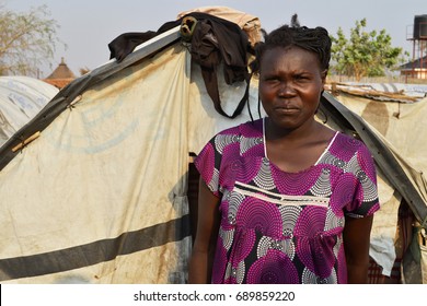 Juba, South Sudan, February 2017. A Woman Standing In Front Of Her Tent At A Salesian Camp For Internally Displaced Persons (IDPs). Captured During Civil War.