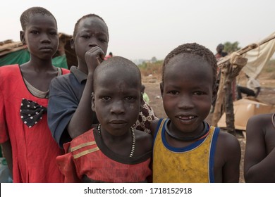 JUBA, SOUTH SUDAN - FEBRUARY 28 2012: Unidentified Kids Pose For Pictures At Displaced Persons Camp In Juba, South Sudan. Juba Is Full Of Refugees Who Live With Their Children In Appalling Conditions.