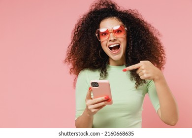 Jubilant happy young curly