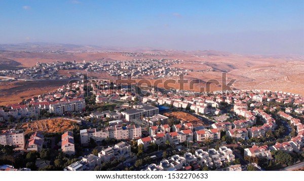 Judean Hills\
landscape Aerial view\
Drone footage over Judean Hills landscape\
With Israel and Palestine\
Towns\

