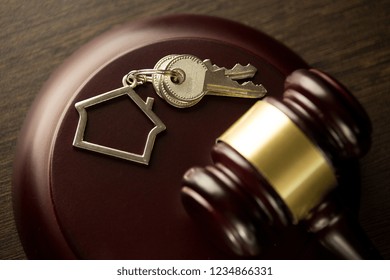 Judge Auctioneer Hammer, Door Key On Wooden Table. Concept For Court, Bankruptcy, Taxes, Mortgage, Auctions, Foreclosure Or Inheritance Of Real Estate