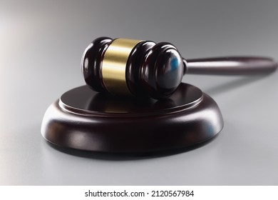 Judge Black Wooden Hammer On Soundboard On Grey Background, Attorney Instrument For Legal Service