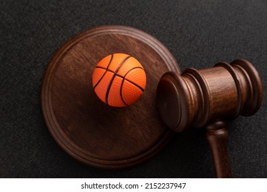 Judge Gavel And Basket Ball, Top View On Black Background. Sport Betting And Law. Litigation