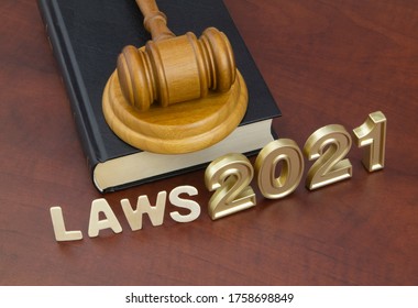 Judge Gavel, Book And Numbers 2021. Concept New Laws In Year 2021.	