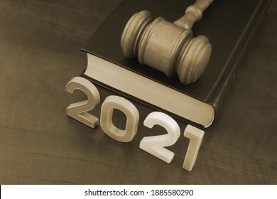 Judge Gavel, Book And Numbers 2021. Concept New Laws In Year 2021.