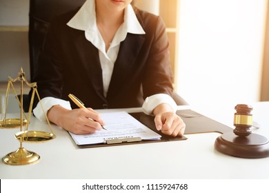 Judge Gavel Justice Lawyers, Business Woman In Suit Or Lawyer Working On A Documents. Legal Law, Advice And Justice Concept.