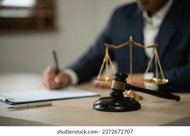 Judge gavel with Justice lawyers having team Concepts of Law and Legal services - Shutterstock ID 2372672707
