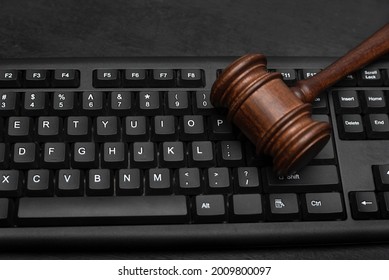 Judge Gavel On Computer Keyboard. Internet Auction. Legal Liability On The Internet.