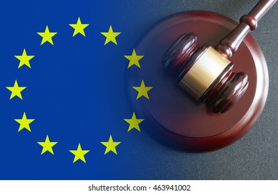 Judge gavel on wooden table, collage with european union flag - Shutterstock ID 463941002