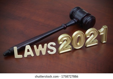 Judge Gavel, Text Laws And Numbers 2021. Concept New Laws In Year 2021.	