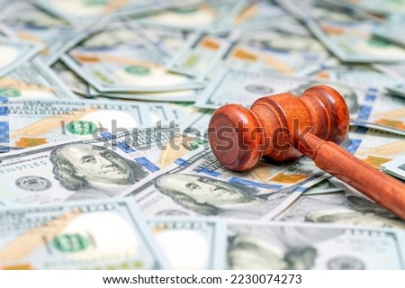 Judge hammer on American money background. Fraud tax fines. Law, judgment and justice concept. Stock foto © 