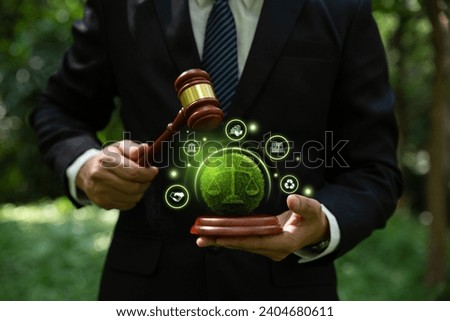 Judge striking gavel with environmental icons, Environmental law and international agreement about protocol for framework convention on climate change, world and environment sustainable concept.
