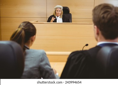 Judge Talking With Lawyers To Make A Decision In The Court Room