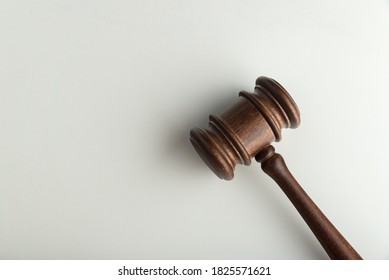 Judge Wooden mallet on white background. Top view. Wooden gavel. Laws and justice.