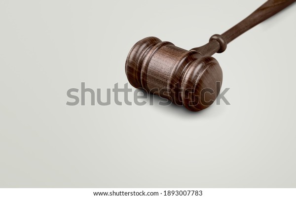 Judge Wooden mallet on white background. Wooden\
gavel. Laws and justice.