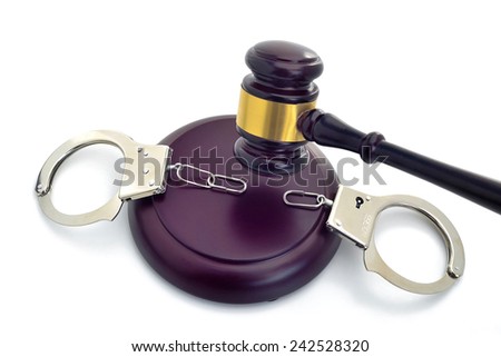 JUDGE'S DECISION FOR SETTING FREE 3 -  A gavel brakes the chain of the handcuffs ordering to set free.
