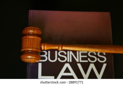 Judges Gavel On A Business Law Book